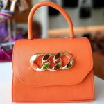 Bolsa Laranja e Preto