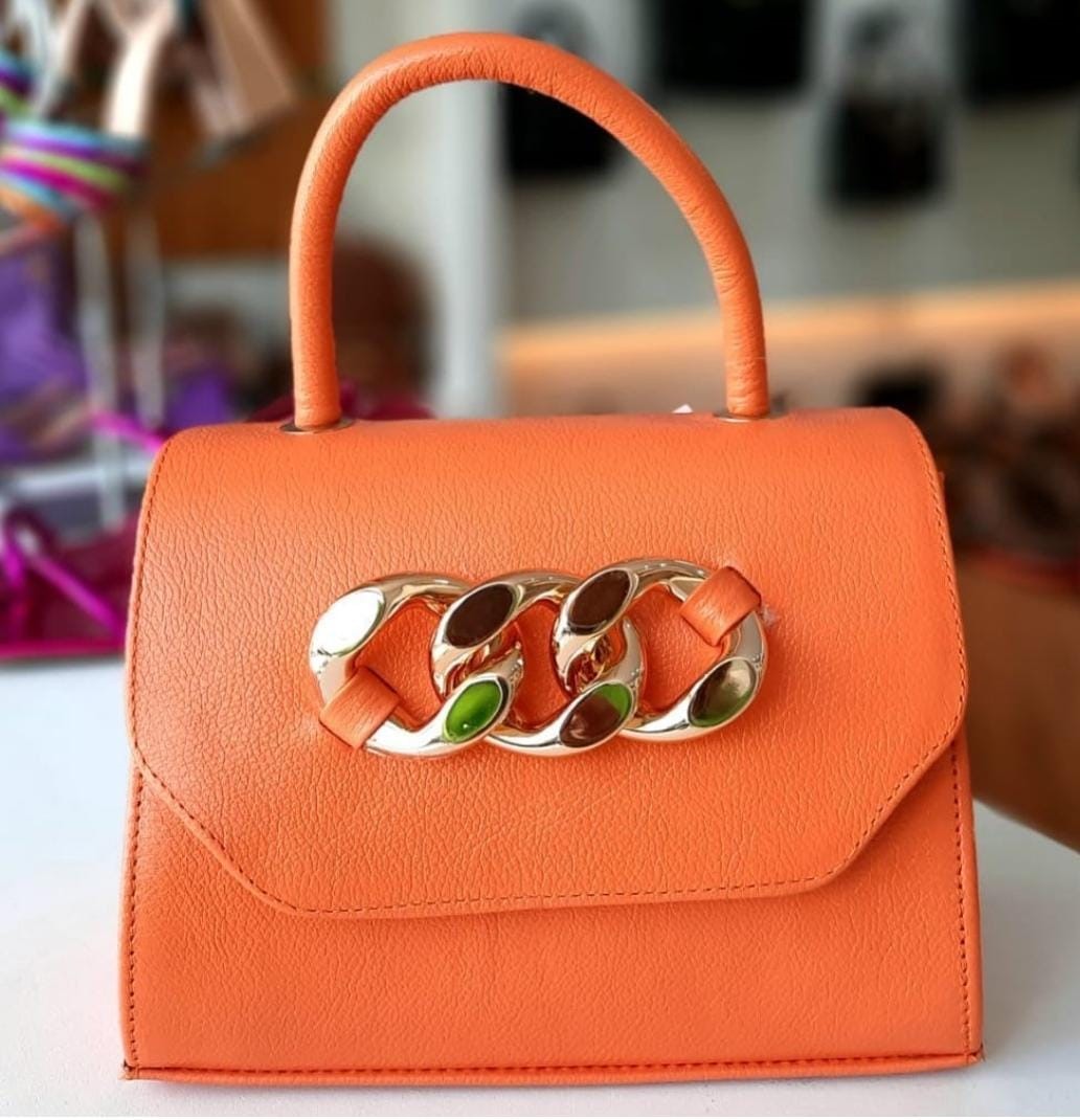 47543abe-1d2d-4964-9c72-ce323fa01ca5 Bolsa Laranja e Preto - Imagem 1