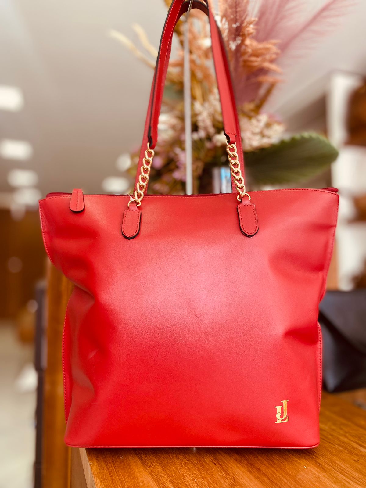 beae7c80-34aa-4c38-94fc-9bc6e8b30512 Bolsa Vermelha - Imagem 1